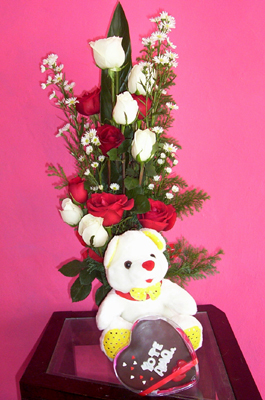 chocolates, osito y flores