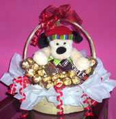 chocolates y perrito en canasta